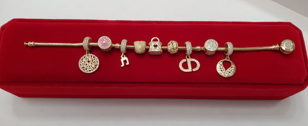 Bracelet with charms gold 10k