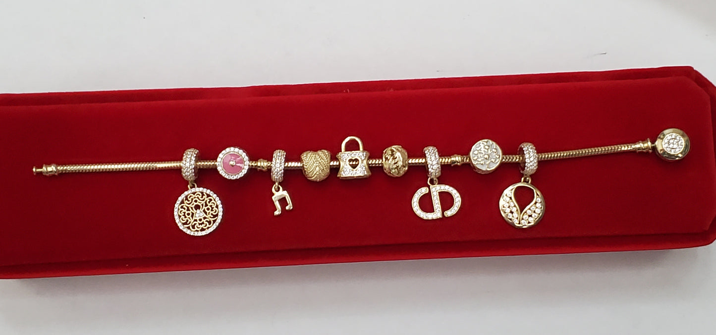 Bracelet with charms gold 10k